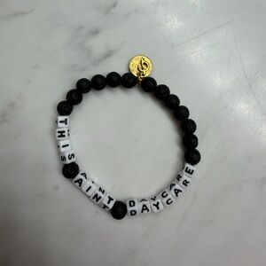 Peloton Alex Toussaint bracelet